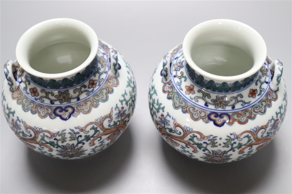 A pair of Chinese two-handled vases, height 15cm